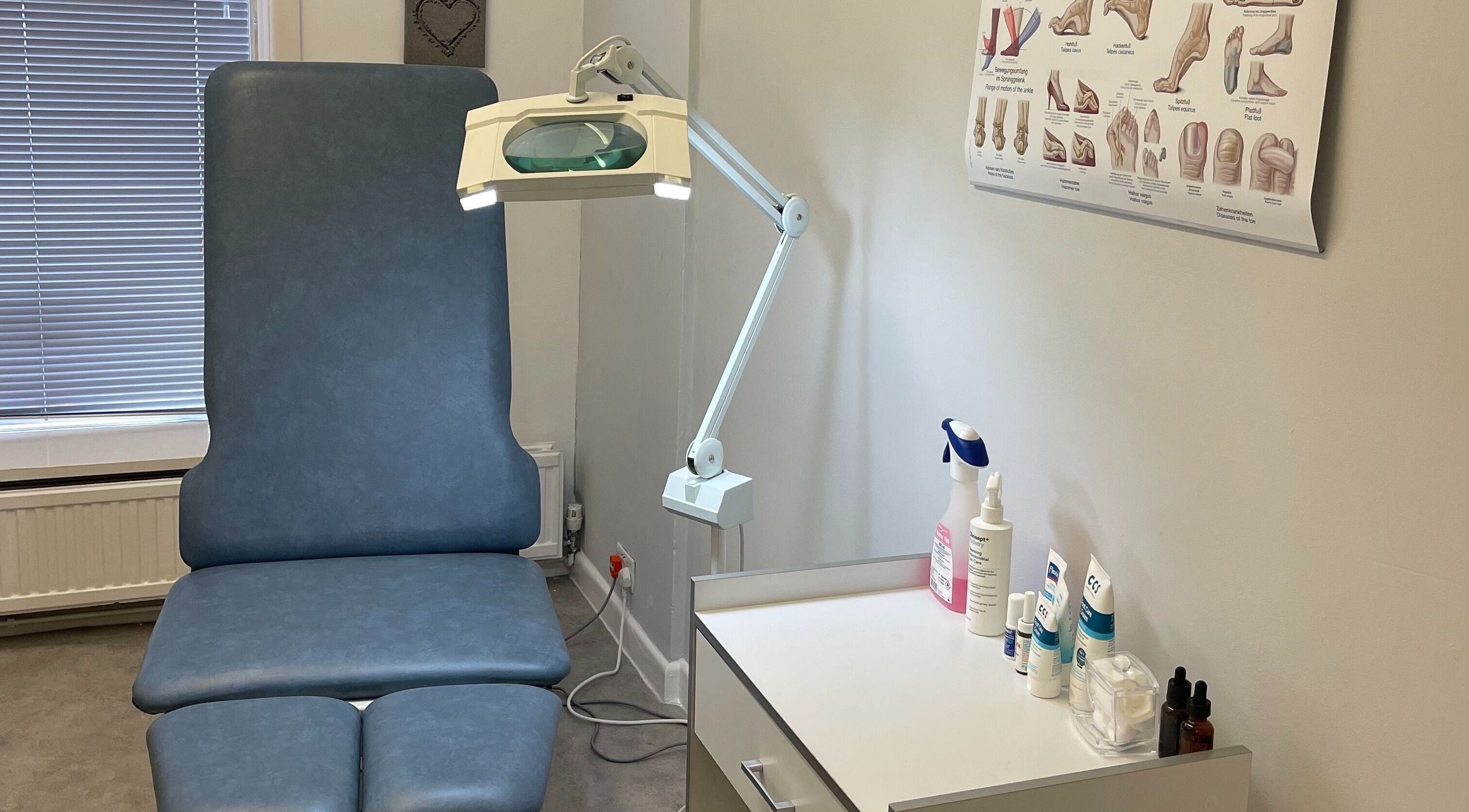 Treatment room at MY FOOT CLINIC (Parkstone), Poole, England, GB featuring a therapy chair and professional equipment.