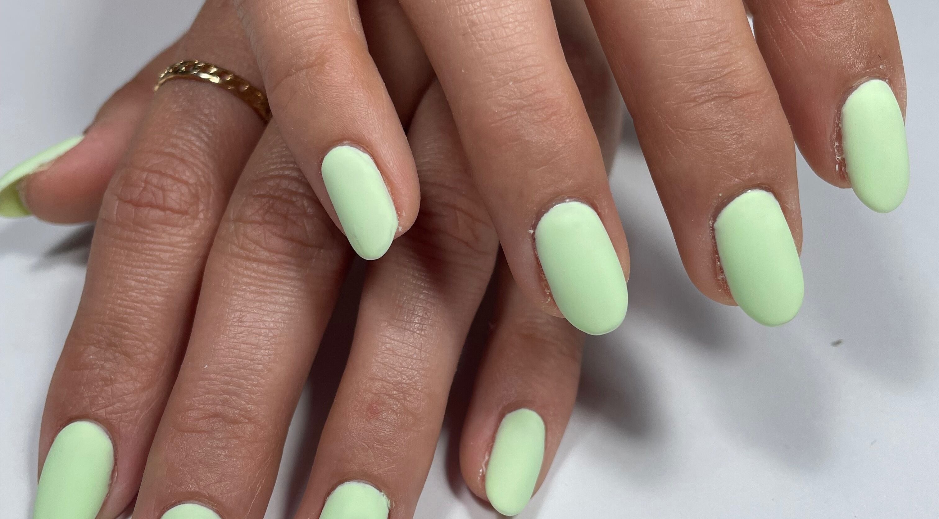 Bright mint green nails at Beau Nails, San Ġwann, MT, showcasing chic elegance and professional manicure.