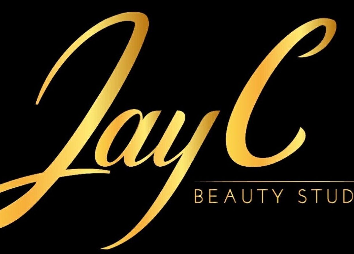 Elegant gold script logo of JayC Beauty Studio, Bridgetown, Christ Church, BB on a sleek black background.