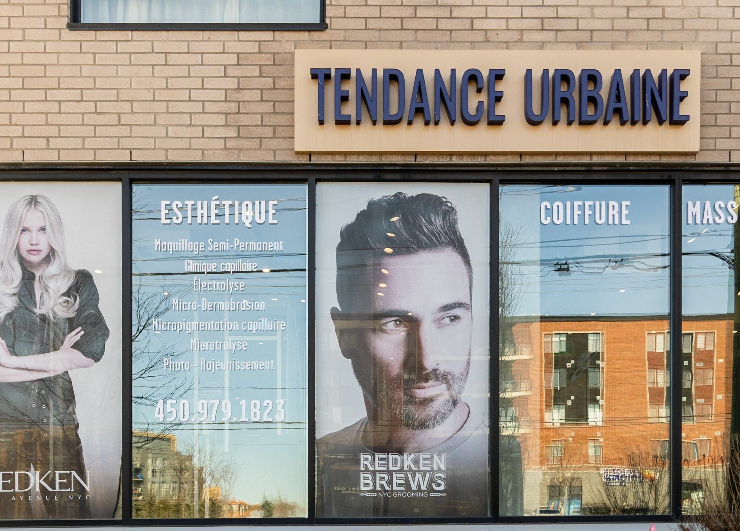 Enseigne de Coiffure Tendance Urbaine à Blainville, Québec, CA, illustrant des services de beauté.