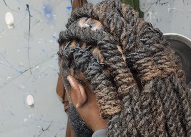 Intricate hair twists at Luxe Beaute Lounge, Brandon, Florida, US, highlighting artistry and style.