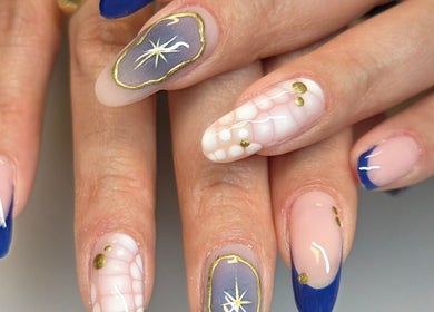 Elegant celestial-themed nail art at Celeste's Nail Studio in Fairfax, Virginia, US.