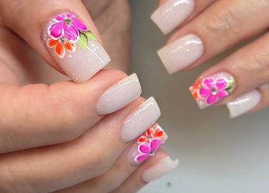Beautiful floral nail art at Celeste's Nail Studio, Fairfax, Virginia, US. Perfect for vibrant and stylish looks.