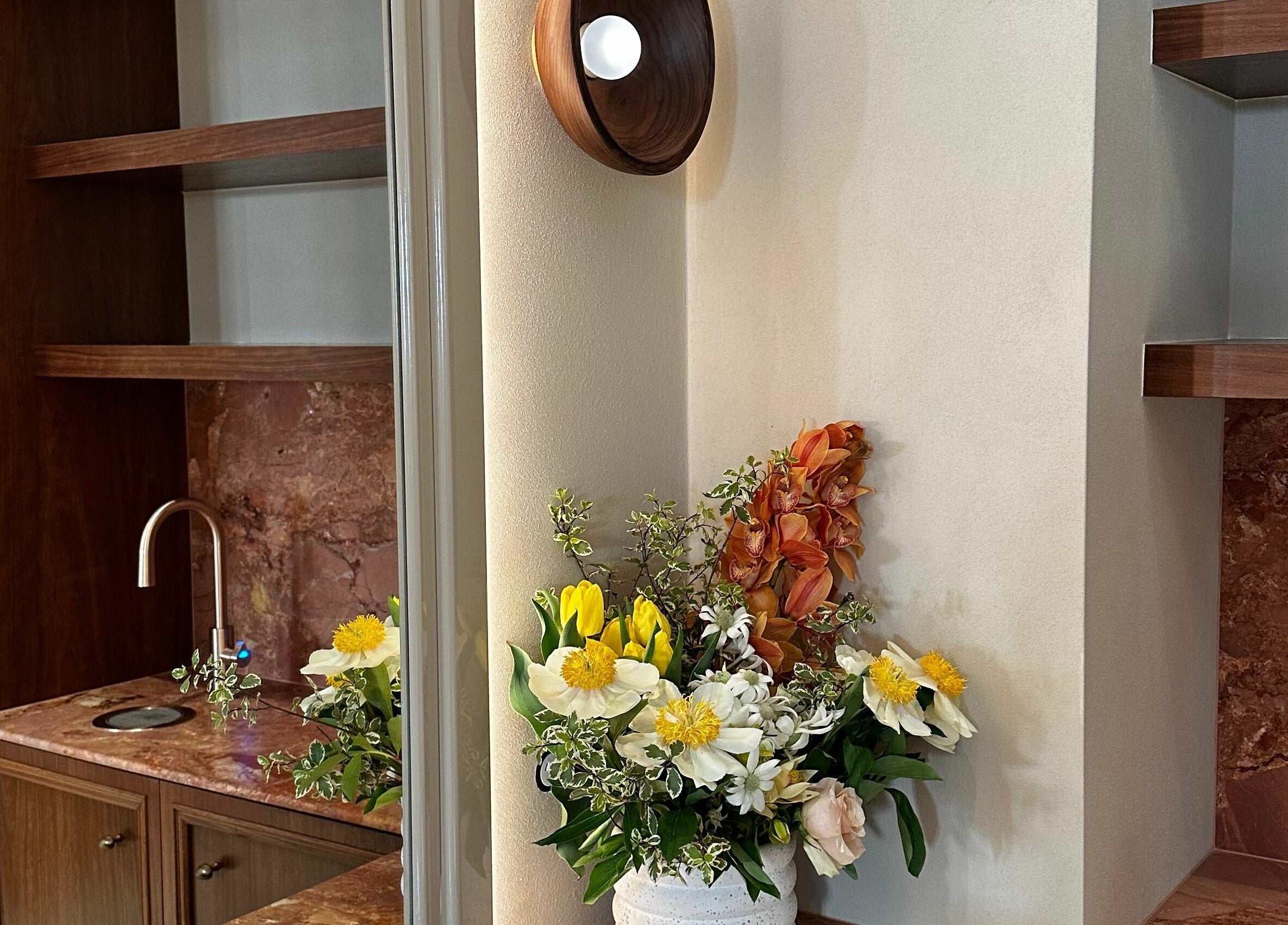 Luxurious flower arrangement at Bennett and Barkell in Wagga Wagga, New South Wales, AU with wood decor.