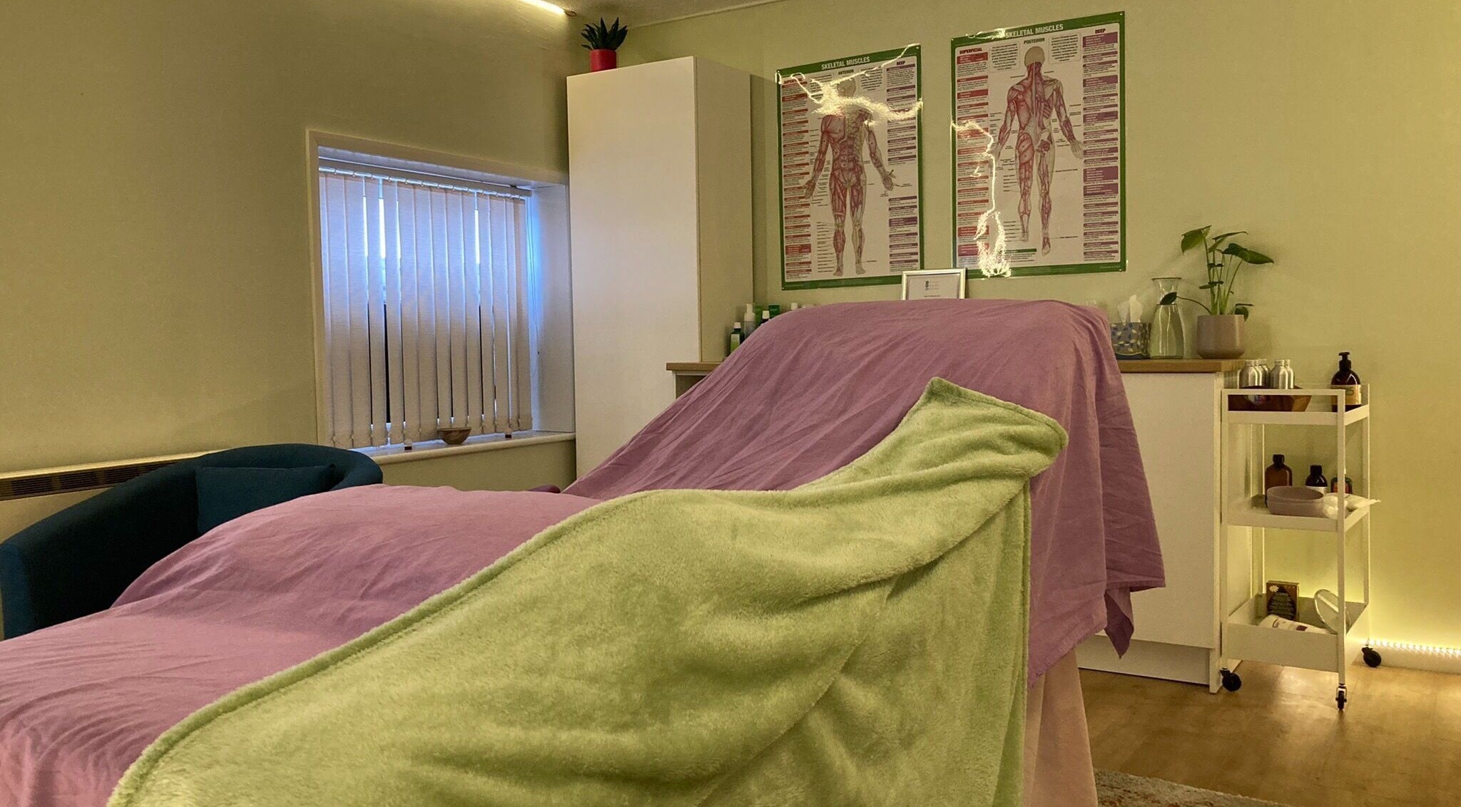 Relaxing massage room at Jacaranda Massage Therapy, Gorleston-on-sea, England, GB with cozy linens and decor.