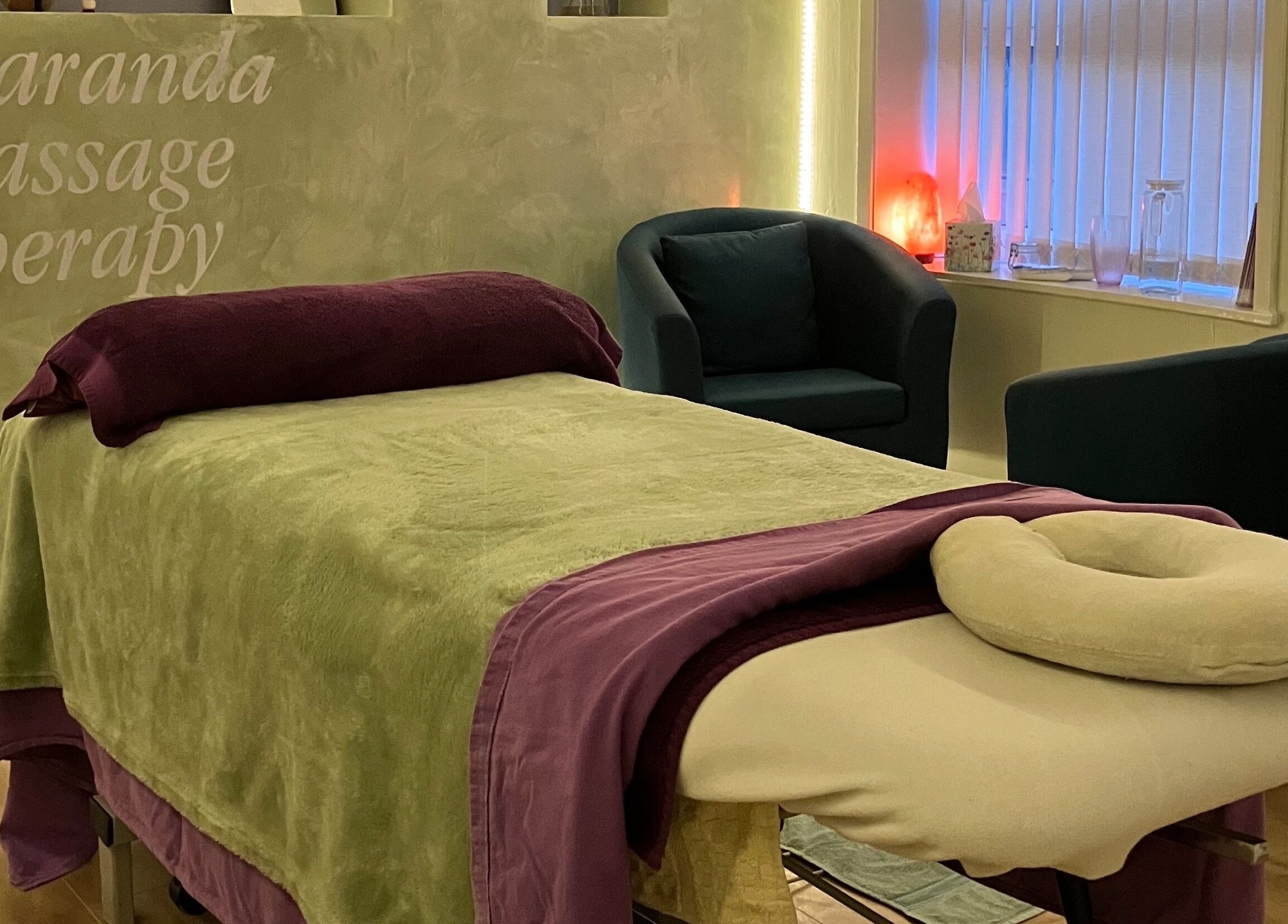 Relaxing therapy room at Jacaranda Massage Therapy in Gorleston-on-sea, England, GB with massage table.