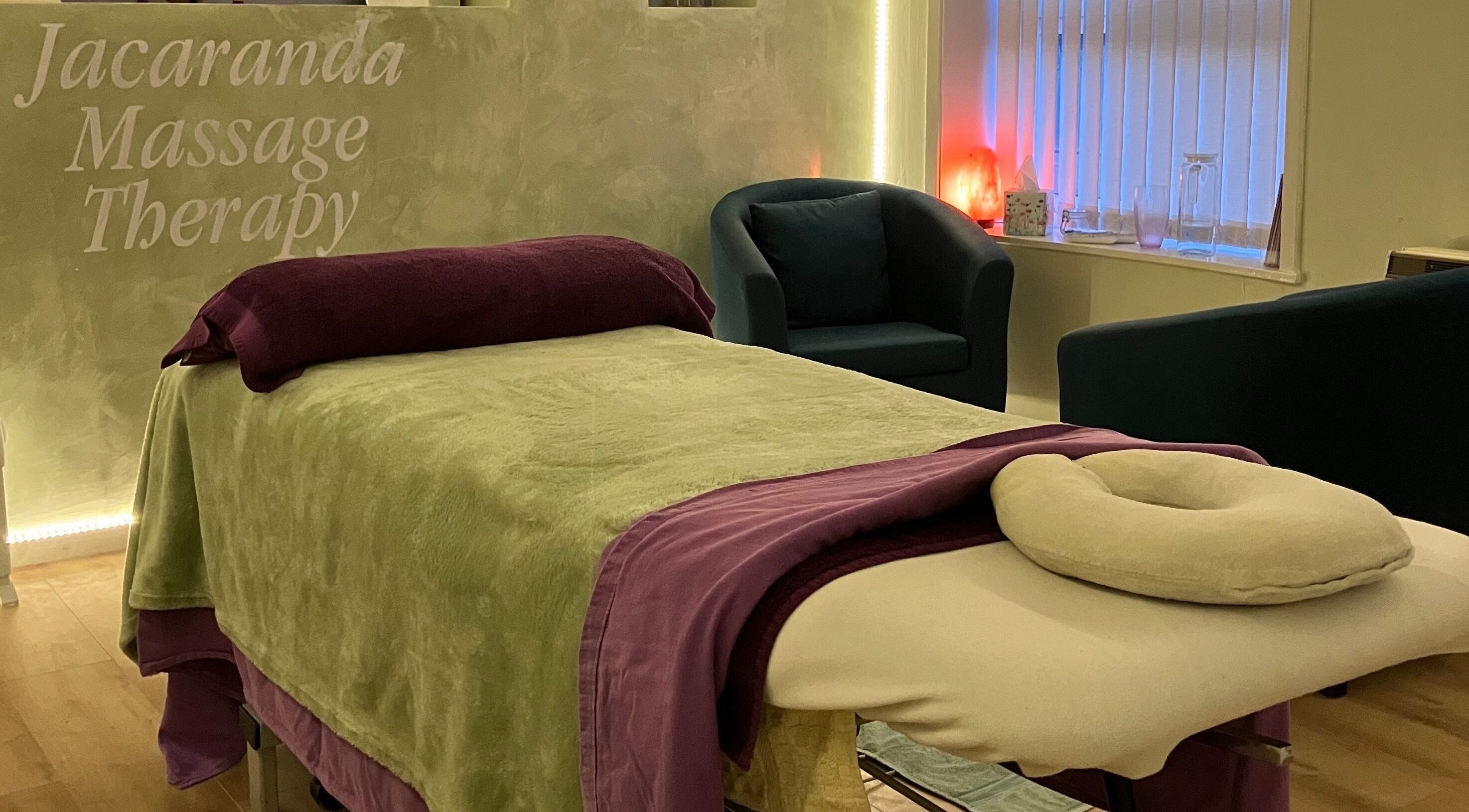 Relaxing therapy room at Jacaranda Massage Therapy in Gorleston-on-sea, England, GB with massage table.