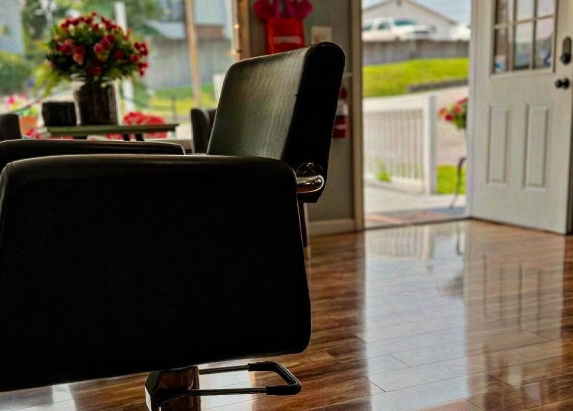 Modern salon chair at Blend, Branson, Missouri, US, with a sunny view enhancing the serene atmosphere.