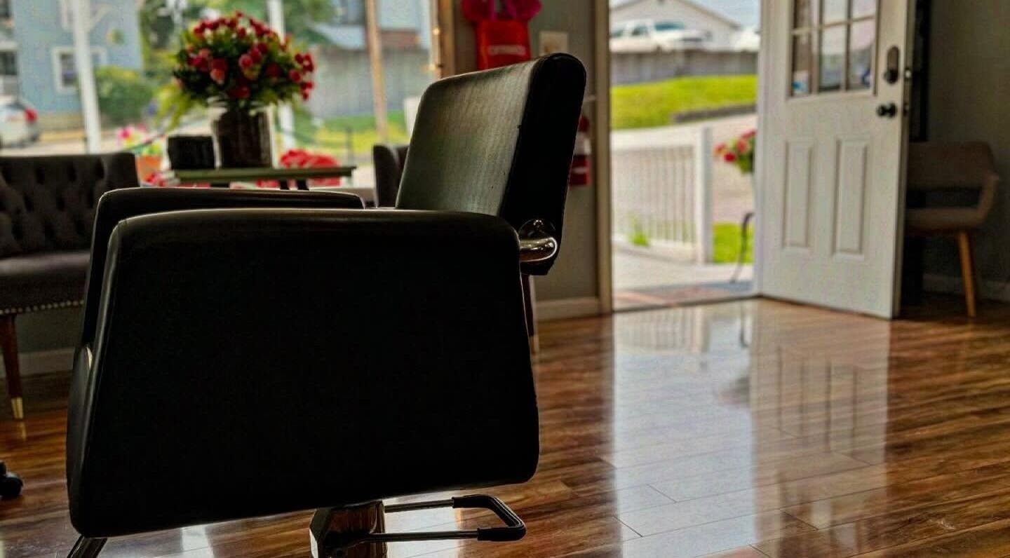 Modern salon chair at Blend, Branson, Missouri, US, with a sunny view enhancing the serene atmosphere.