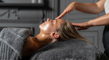Relaxing head massage at Wellness at The Laslett, London, England, GB for ultimate relaxation and rejuvenation.