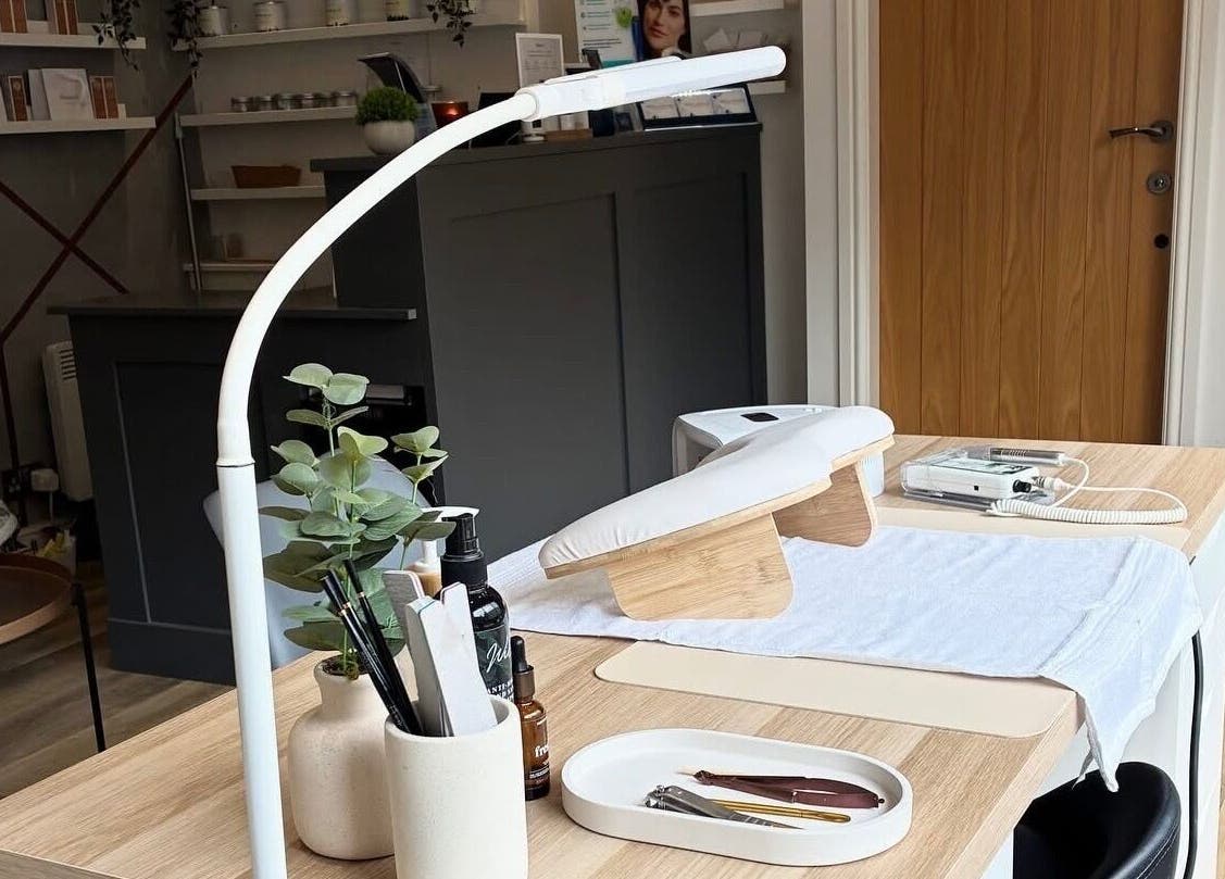 Elegant beauty setup at BELÀR esthetics in Disley, England, GB showcasing a serene manicure station.