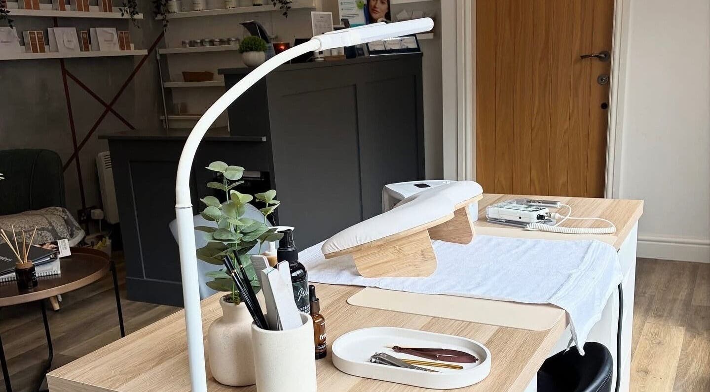 Elegant beauty setup at BELÀR esthetics in Disley, England, GB showcasing a serene manicure station.