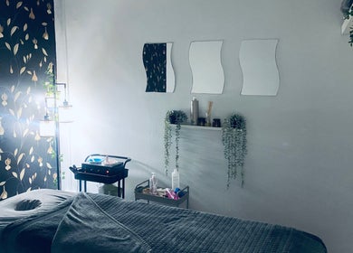 Relaxing massage room at Head to Toe in Grassmoor, England, GB adorned with stylish decor and calming ambiance.