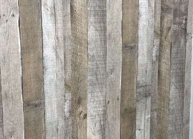 Rustic wooden wall detail at Head to Toe, Grassmoor, England, GB showcasing natural texture and warmth.