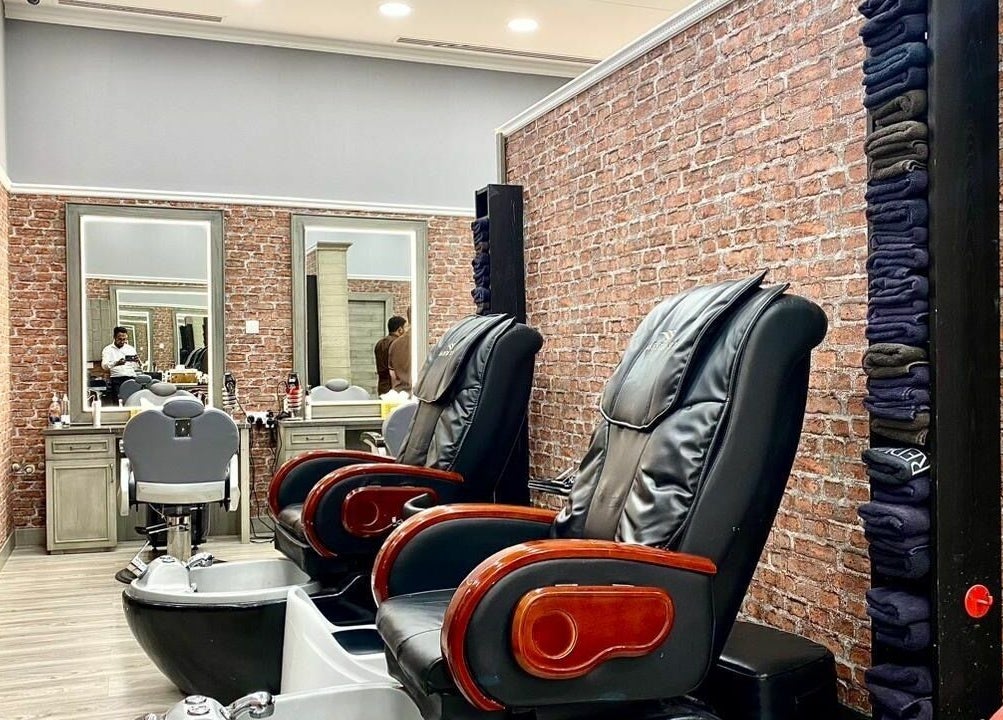 Luxurious seating at Vintage Men's SPA - Al Wahada Mall, Abu Dhabi, AE. Experience ultimate relaxation.