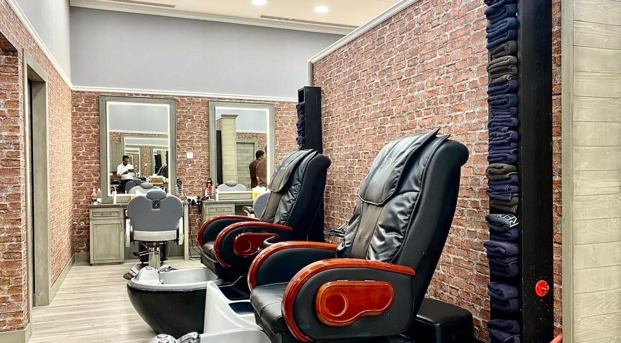Luxurious seating at Vintage Men's SPA - Al Wahada Mall, Abu Dhabi, AE. Experience ultimate relaxation.
