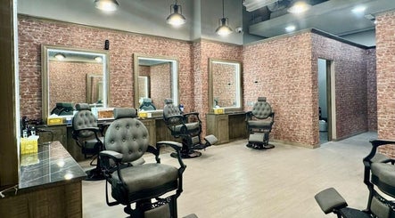 Vintage Men's Spa Al Raha Mall interior, featuring plush barber chairs in Abu Dhabi, Abu Dhabi, AE.