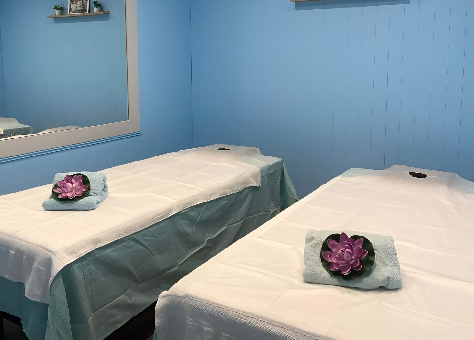 Relaxing massage room at Thai Unique Massage at Dickson, Australian Capital Territory, AU with two tables.