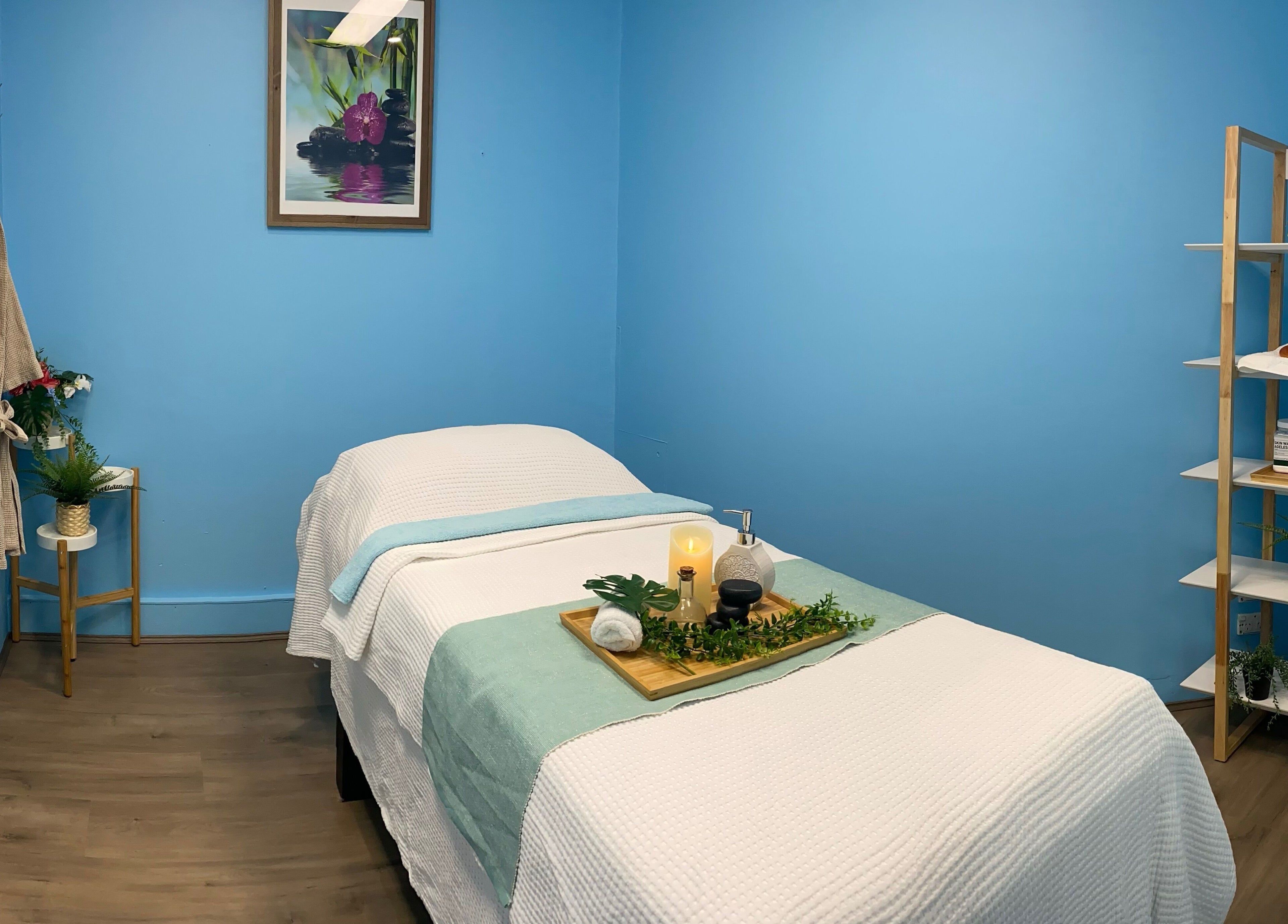 Cozy massage room at Thai Unique Massage in Dickson, Australian Capital Territory, AU with calming blue tones.