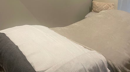 Relaxing massage bed at Blissful Beauty and Massage Therapy in Glastonbury, England, GB.