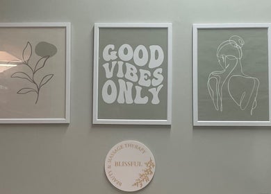 Artistic wall decor at Blissful Beauty and Massage Therapy in Glastonbury, England, GB adds serene ambiance.