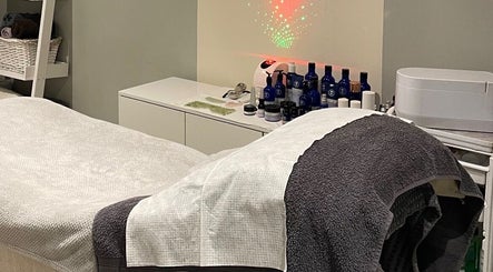 Relaxing massage room at Blissful Beauty and Massage Therapy, Glastonbury, England, GB with calming decor.