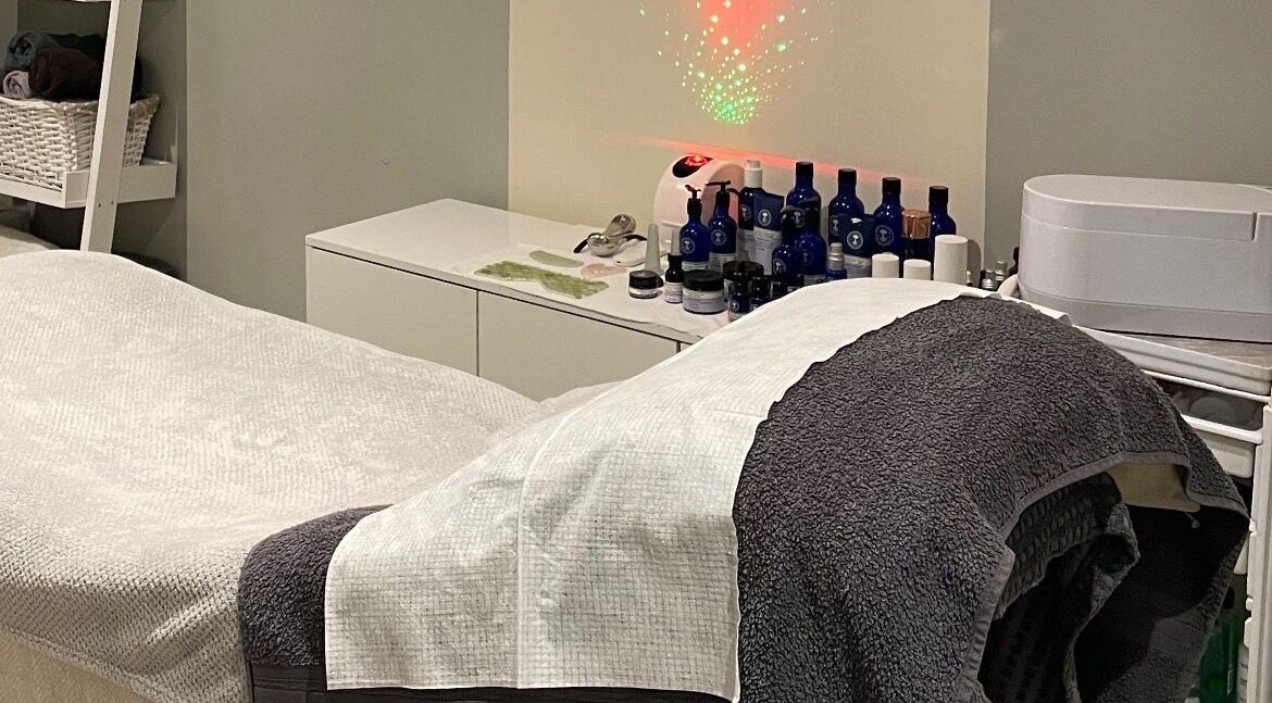 Relaxing massage room at Blissful Beauty and Massage Therapy, Glastonbury, England, GB with calming decor.