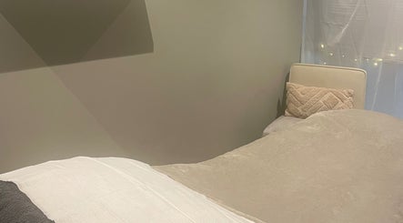 Tranquil massage room at Blissful Beauty and Massage Therapy, Glastonbury, England, GB.