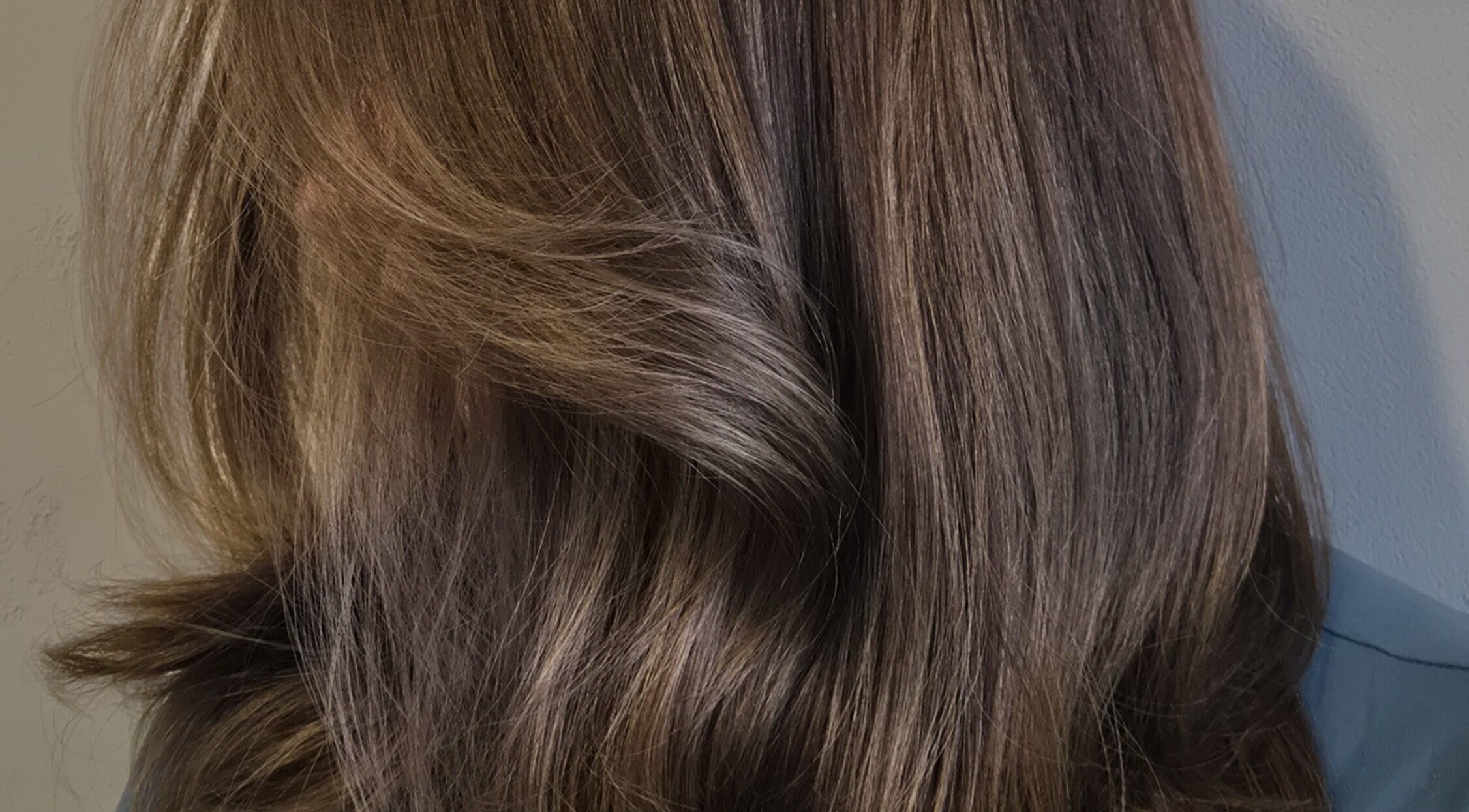 Lustrous brown hair styled at Studio Noir (Maddi), Appleton, Wisconsin, US.