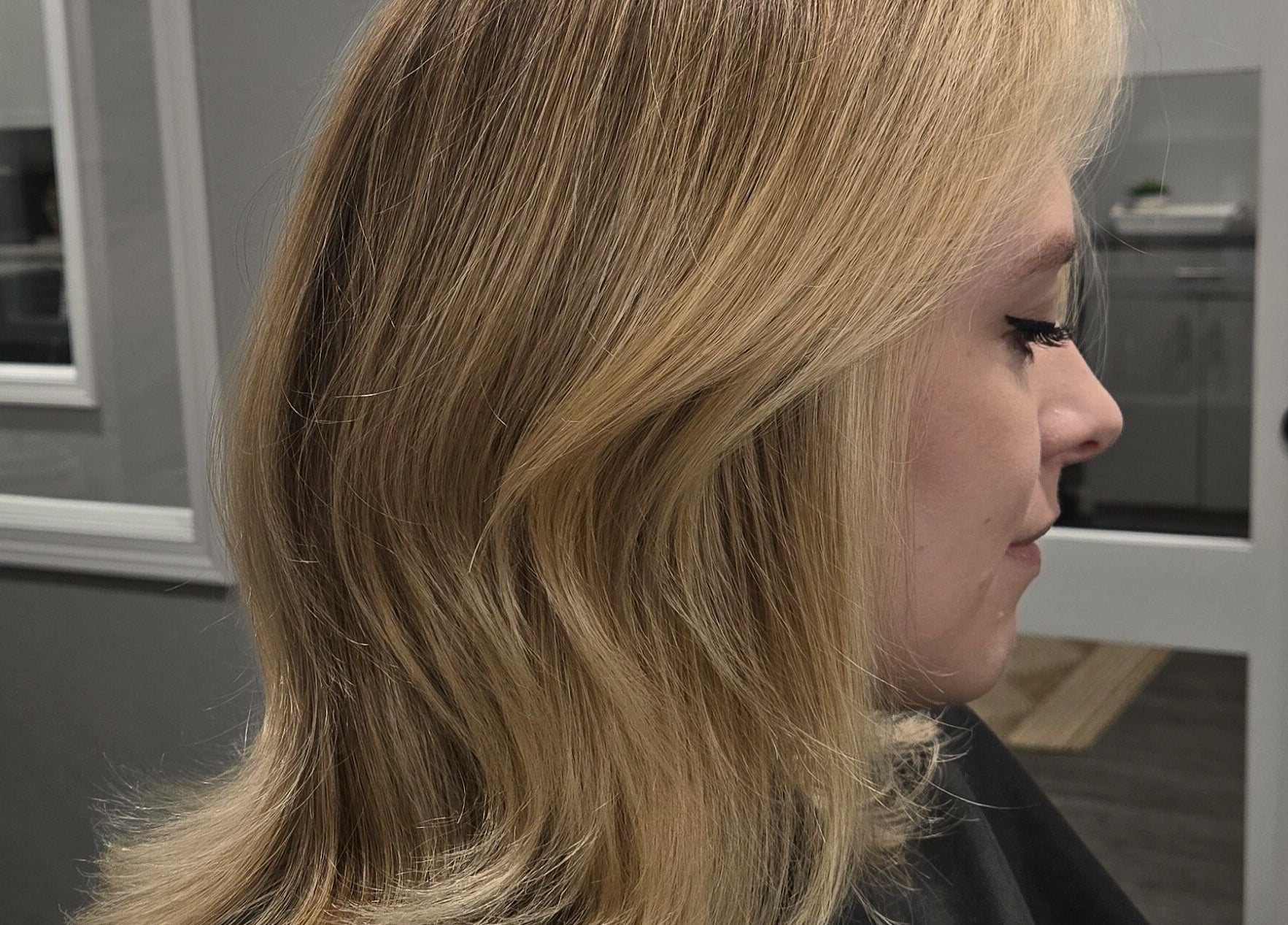 Blonde hairstyle at Studio Noir (Maddi), Appleton, Wisconsin, US.