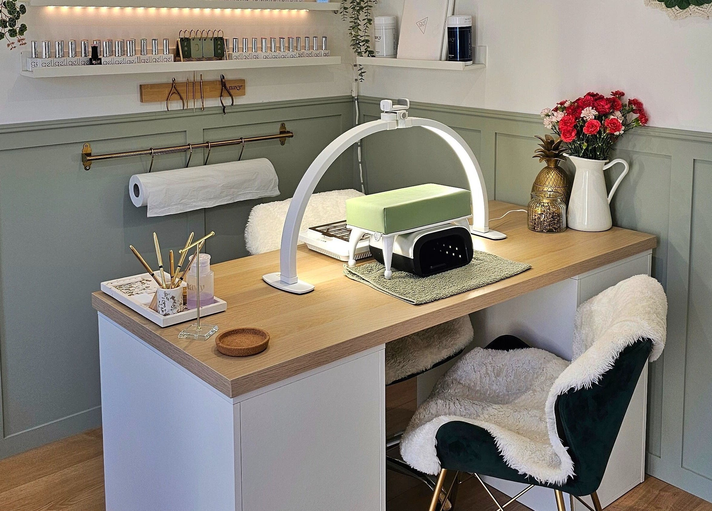 Cozy nail station at By the Shaw, Beer, England, GB, featuring chic decor and professional manicure tools.