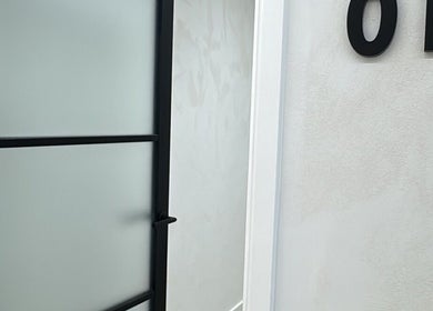 Elegant entrance of Emily Jane PMU & Brows in Truro, England, GB features sleek design.