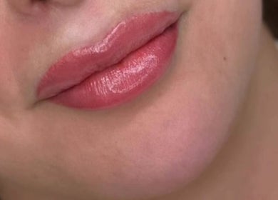 Close-up of glossy lips by Emily Jane PMU & Brows, Truro, England, GB, showcasing expert lip enhancement.