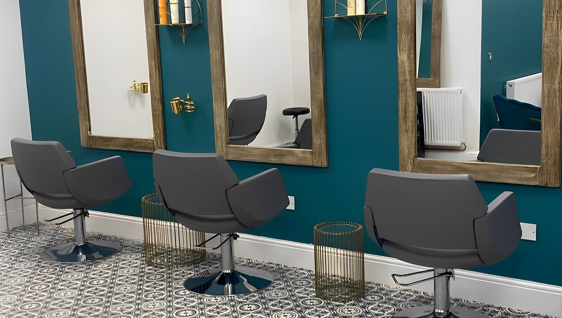Modern salon chairs and mirrors at Graceful, Glossop, England, GB, offering a chic and relaxing ambiance.