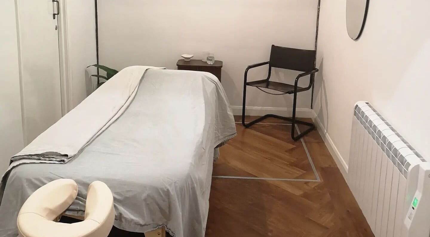 Serene massage room at Amelia Balding Massage at Pivotal House, Norwich, England, GB with a comfortable table.
