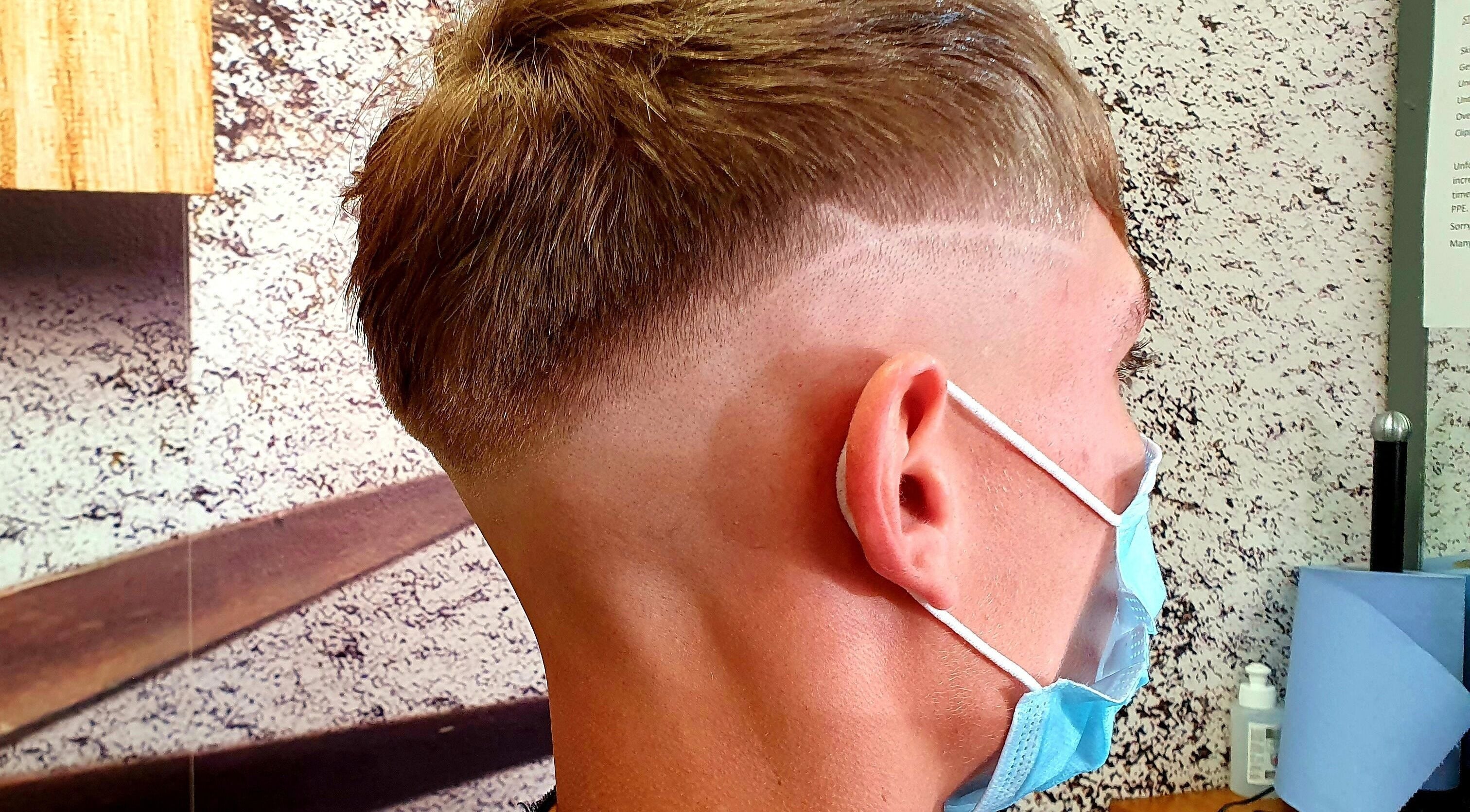 Modern fade haircut at Stefs barber's Forfar, located in Forfar, Scotland, GB. Expert style and precision.