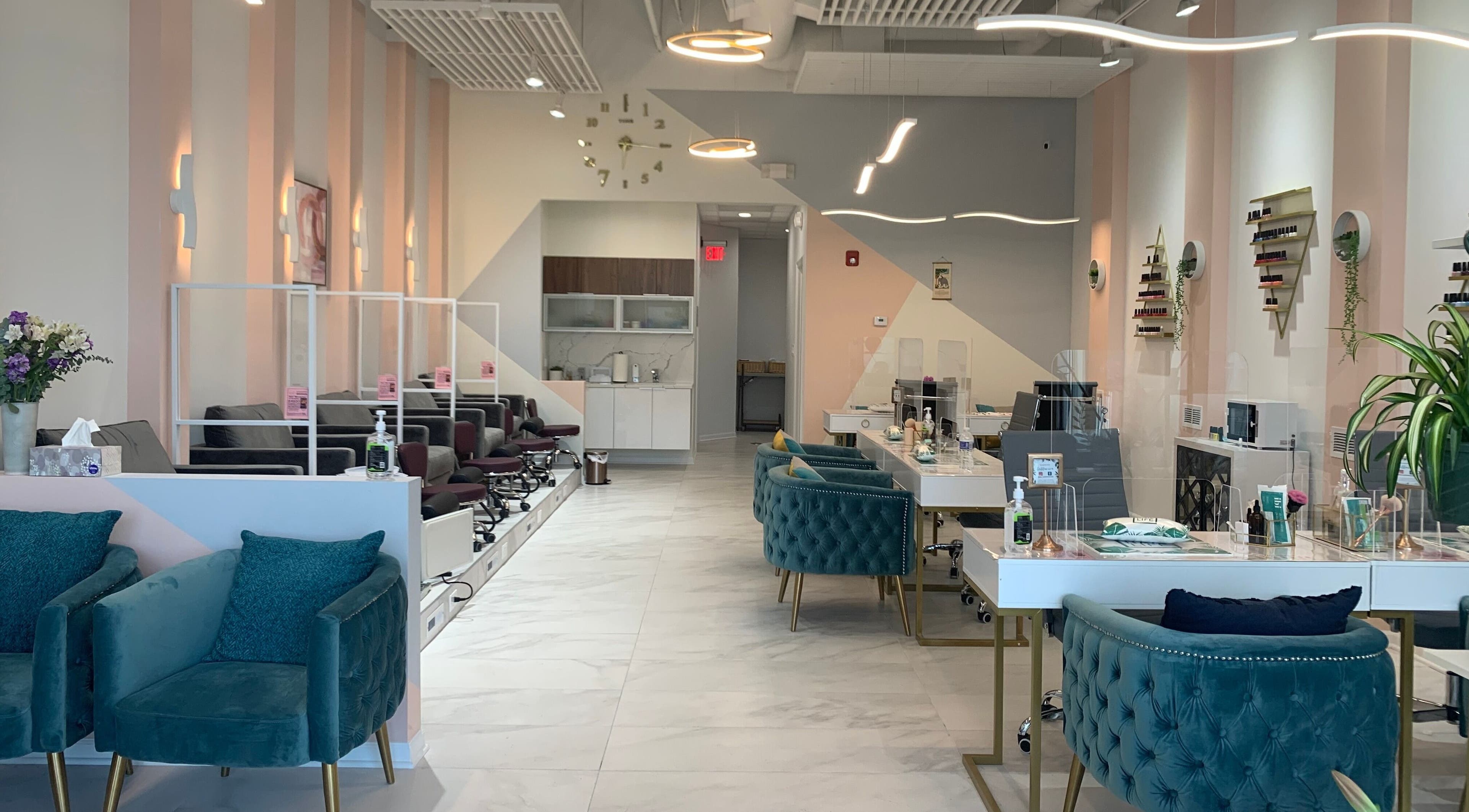 Elegant interior of Bellaviva LLC, a beauty venue in Aurora, Illinois, US with plush seating and modern decor.