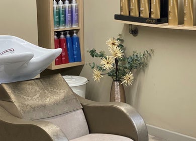 Luxurious wash station at Carly and Co Hairdressing, Morecambe, England, GB, with elegant decor and products.