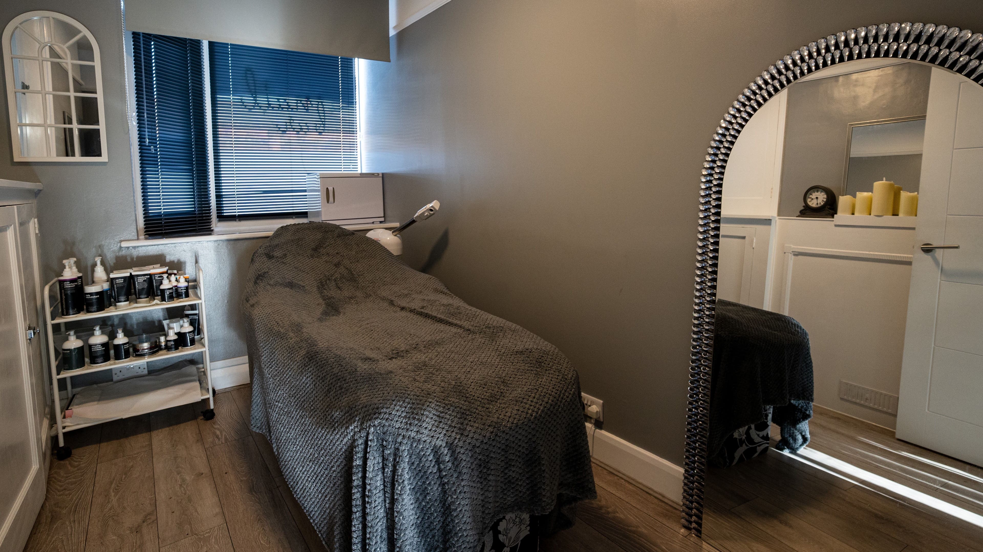 Cozy treatment room at Cuts ‘N’ Clippers Refinery Rooms Horley, England, GB, perfect for beauty and wellness treatments.
