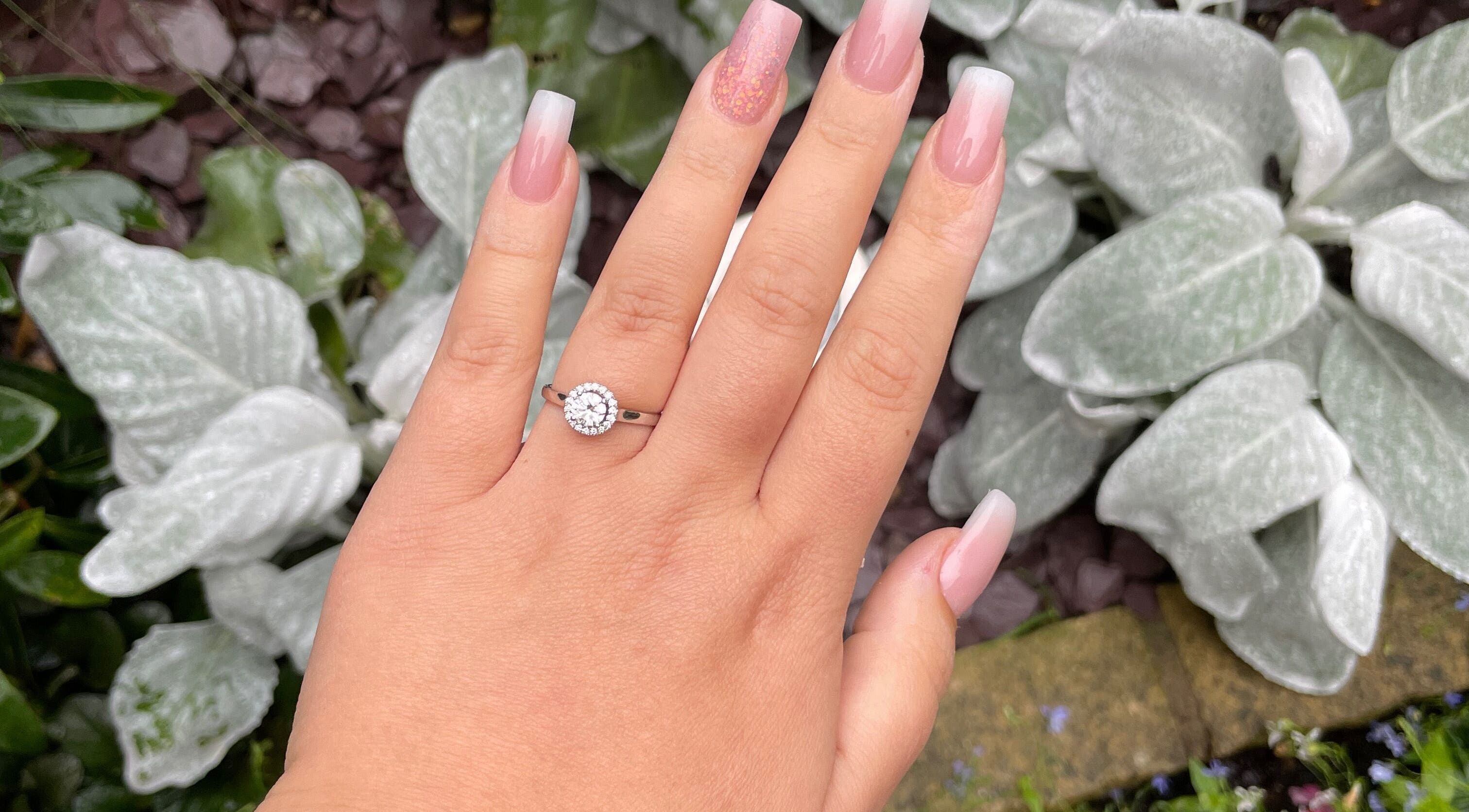 Sophisticated nail art at Salon 65 Lytham in Lytham Saint Annes, England, GB, featuring pastel shades and a diamond ring.