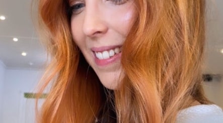 Smiling woman with vibrant hair at Luxe Hair Lab, Kyneton, Victoria, AU.