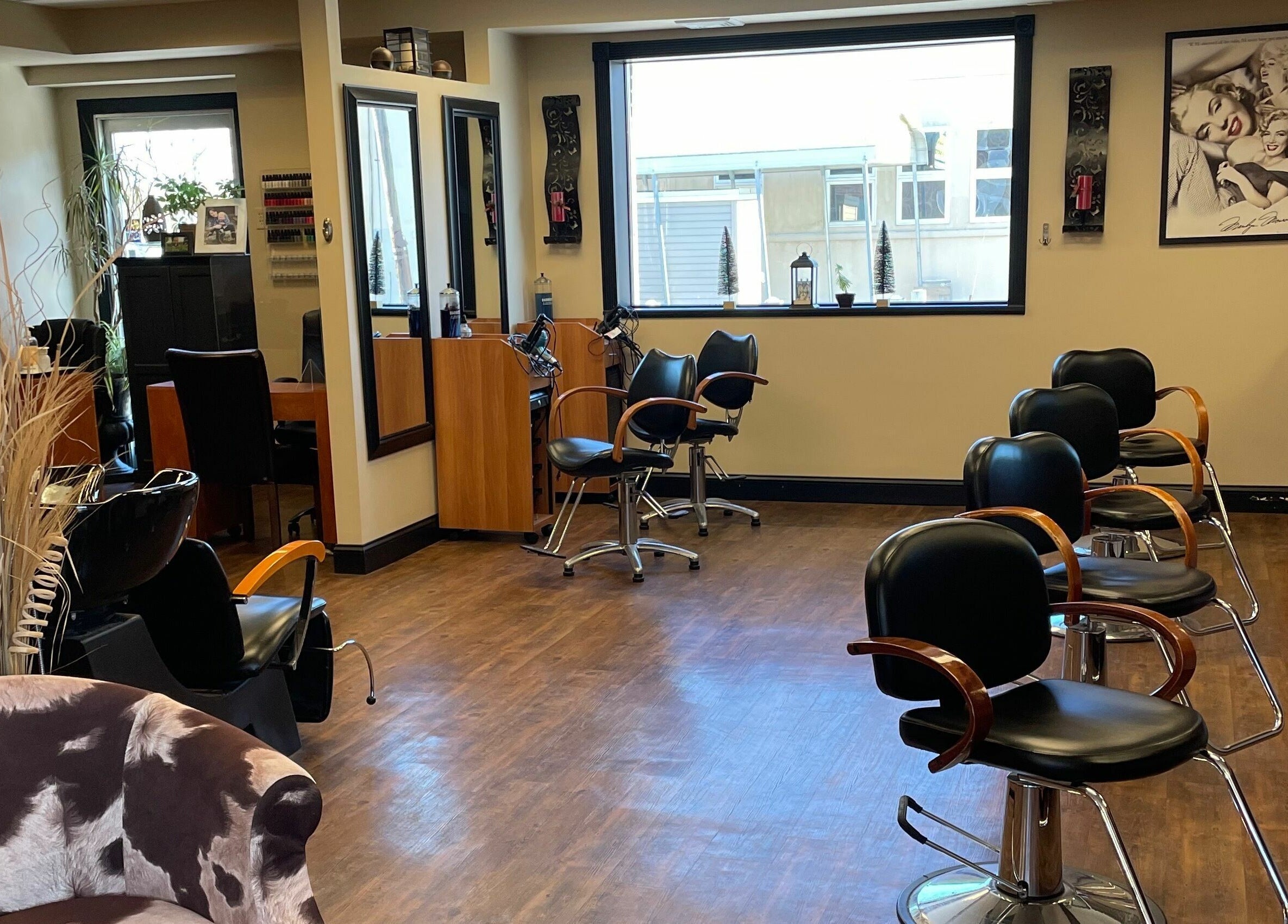 Shear Expression salon interior with stylish chairs and mirrors, Newton, New Jersey, US.