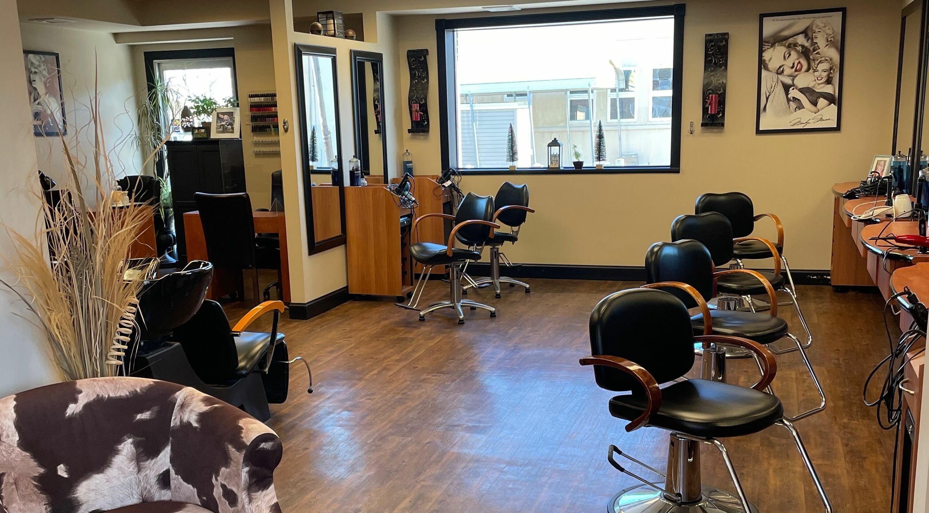 Shear Expression salon interior with stylish chairs and mirrors, Newton, New Jersey, US.