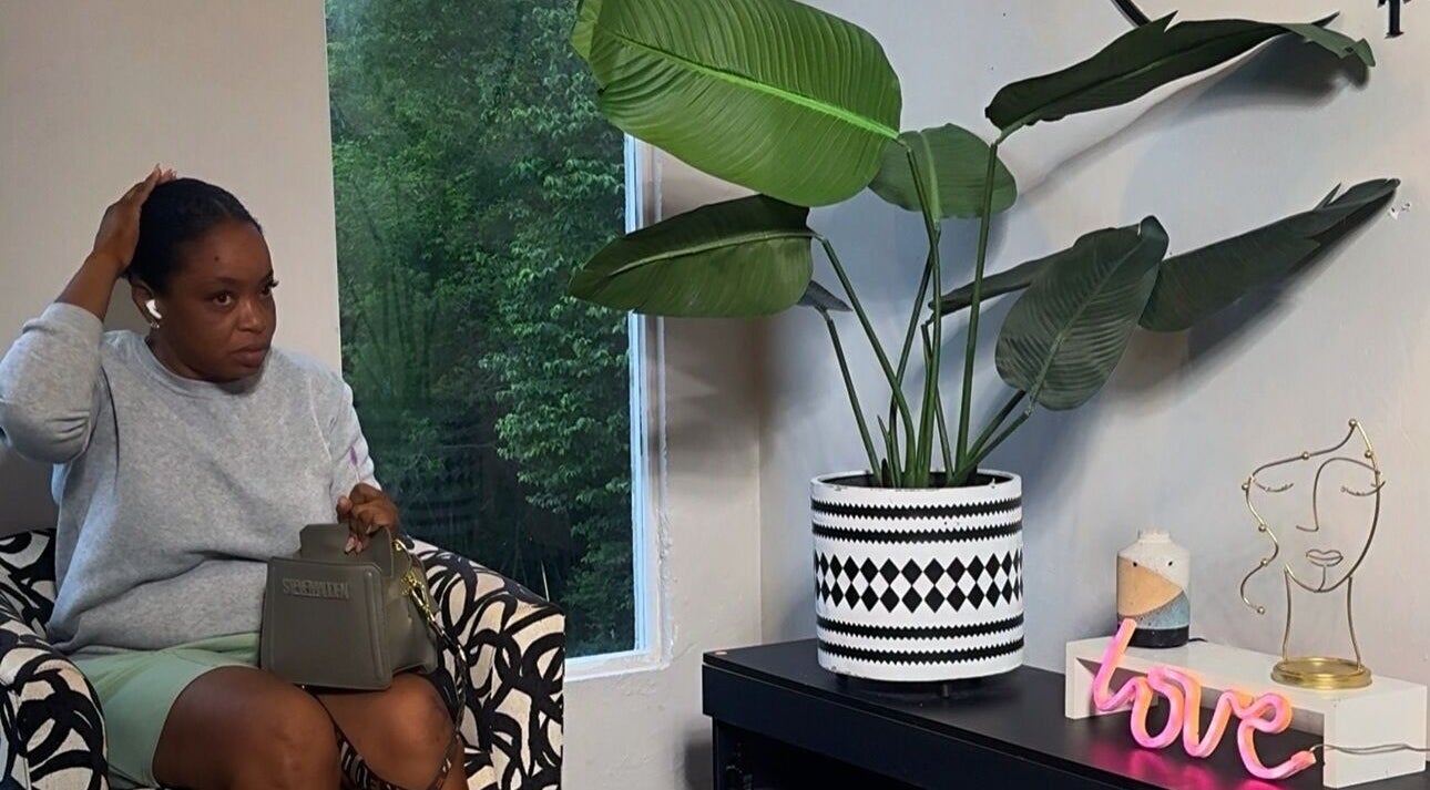 Relaxing lounge area at ILASHTT crown point, Bon Accord, Tobago, TT with greenery and modern decor.