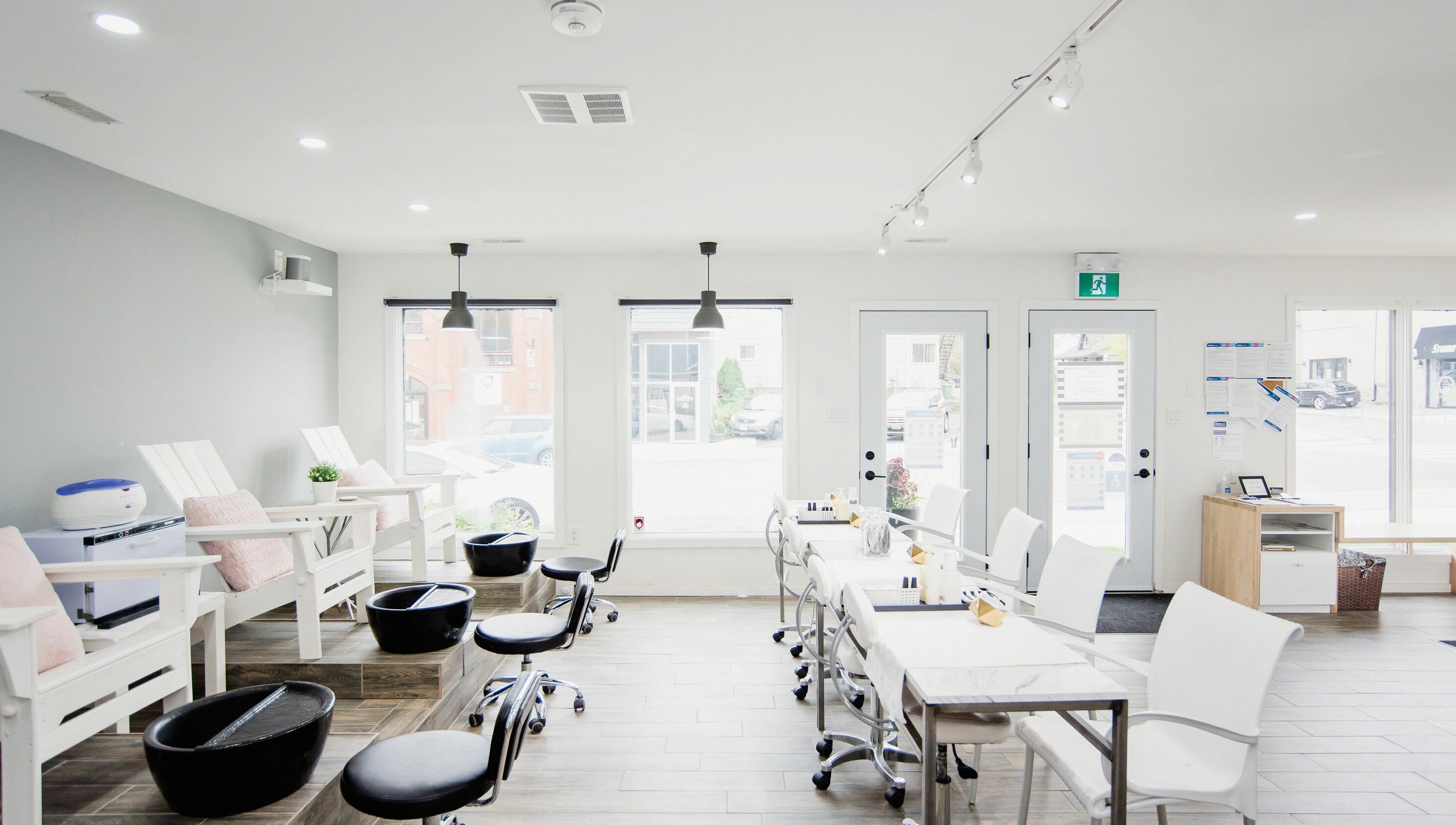 Bright and modern nail salon at Flo Aesthetics Nails Laser in Hamilton, Ontario, CA, featuring sleek interiors.