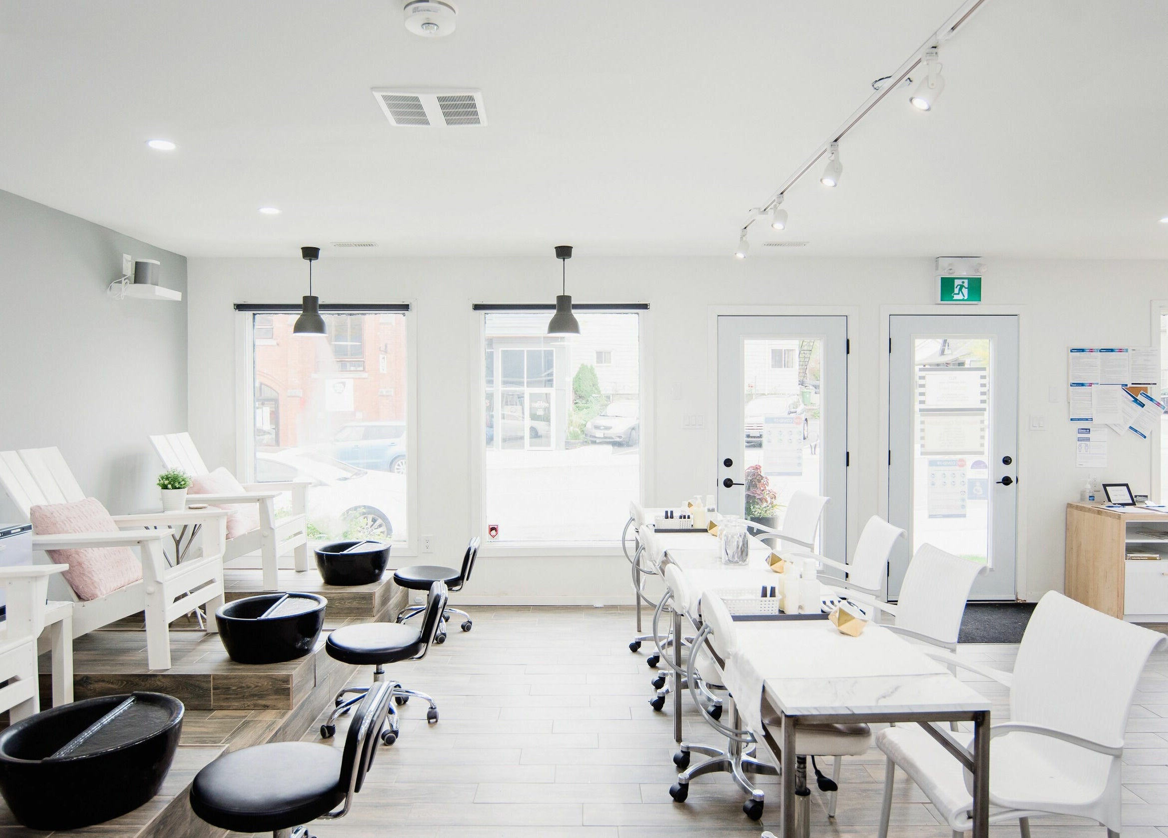 Bright and modern nail salon at Flo Aesthetics Nails Laser in Hamilton, Ontario, CA, featuring sleek interiors.