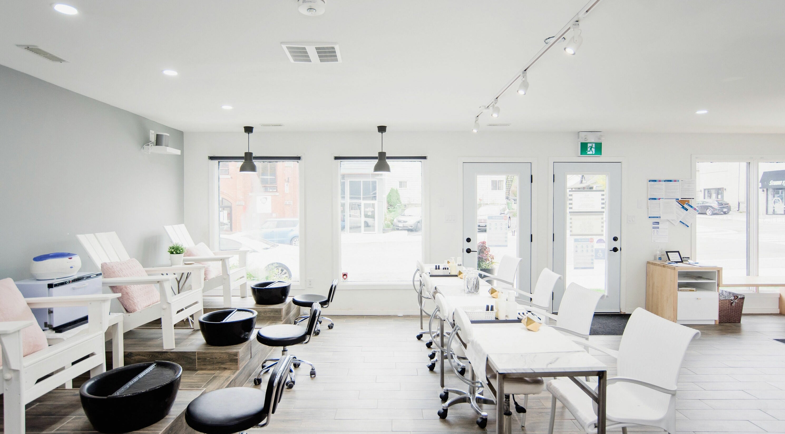 Bright and modern nail salon at Flo Aesthetics Nails Laser in Hamilton, Ontario, CA, featuring sleek interiors.