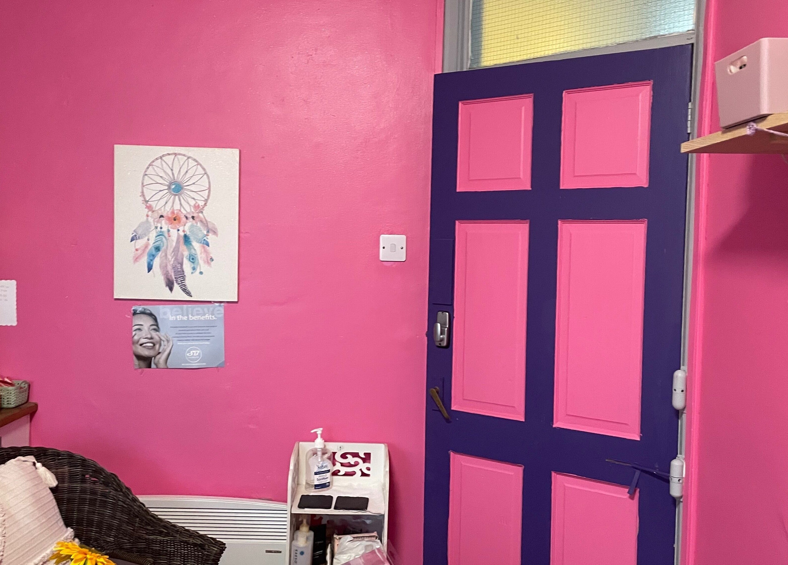 Bright pink room at A Little Unorthodox, Allesley Coventry, England, GB with colorful decor and cozy seating.