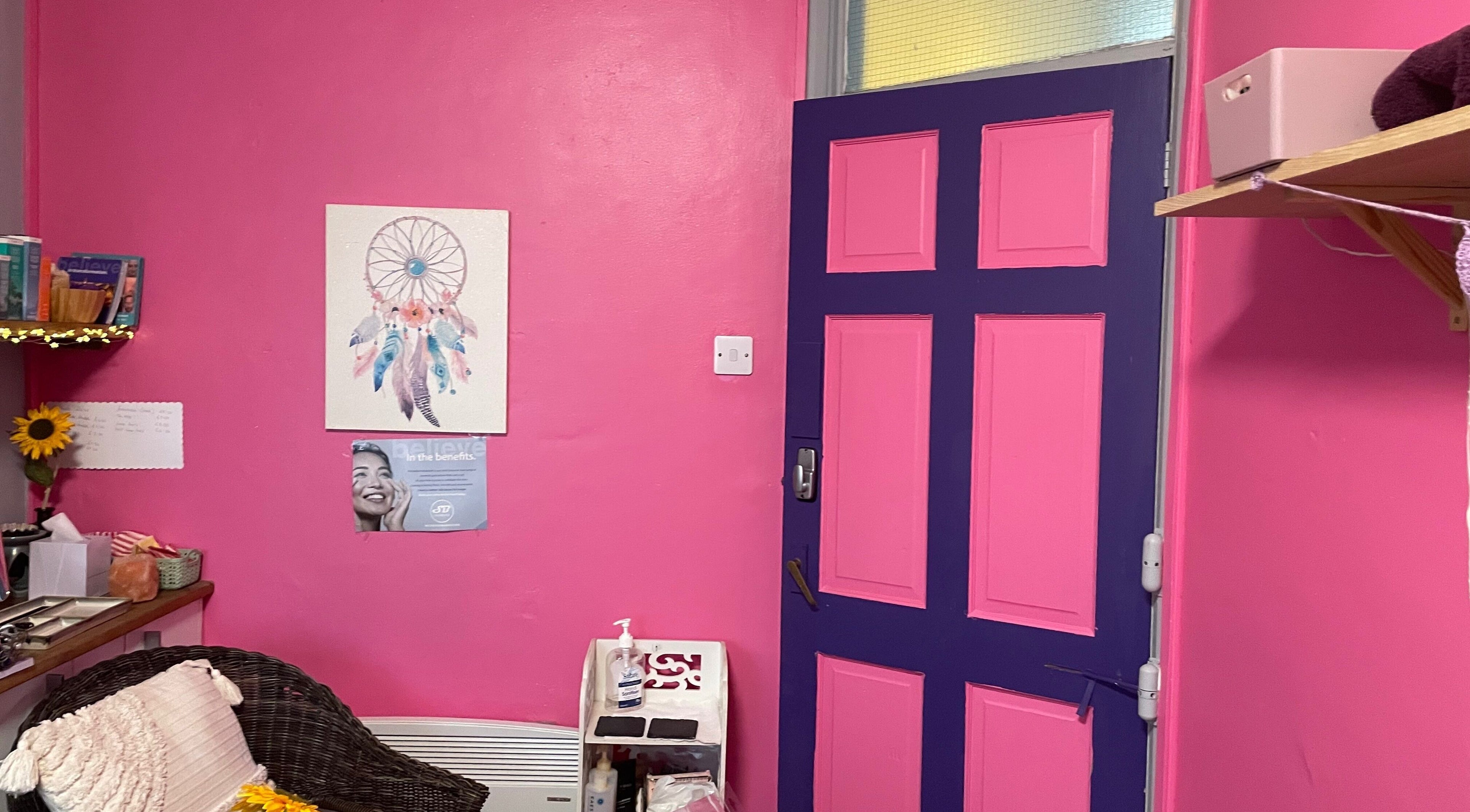 Bright pink room at A Little Unorthodox, Allesley Coventry, England, GB with colorful decor and cozy seating.