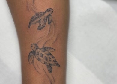 Two detailed turtle tattoos on arm at Fineline Tattoos By Carla, Melbourne, Victoria, AU.
